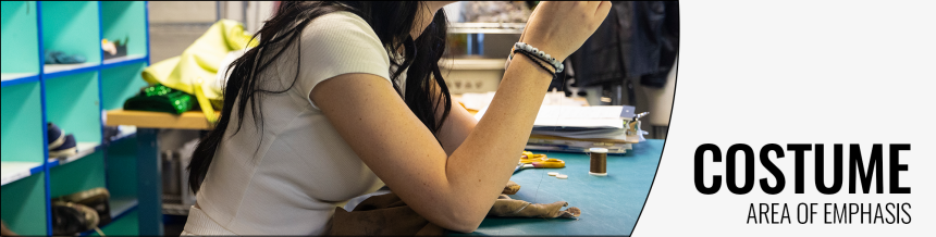 Student working in a costume shop.
