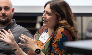 A woman speaking on a panel