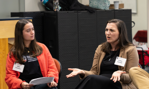 a female panelist being interviewed by a student