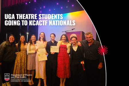 Students standing w/ faculty at awards festival holding awards